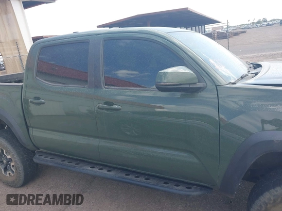 2021 Toyota Tacoma SR z VIN 3TYCZ5AN2MT049069, wystawiony jako IAAI lot #42116964 z przebiegiem 96 275 mil mil oraz . Historia ofert i sprzedaży dostępna na DreamBid. Obrazek 13.