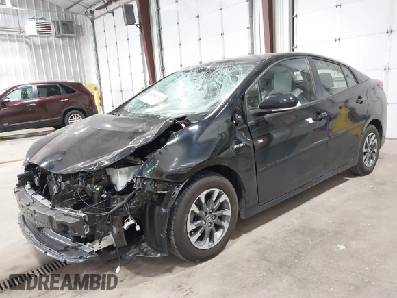 2022 Toyota Prius L Eco with VIN JTDKAMFU2N3186072, listed as a IAAI auction lot 42486252 with 5,887 mi miles and . Bid and sale history available at DreamBid. Image 18.