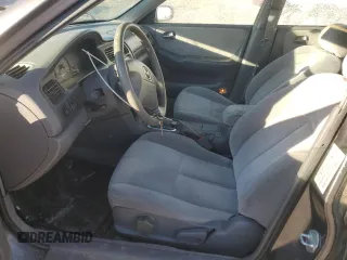 2000 Mazda 626 LX with VIN 1YVGF22D5Y5120152, listed as a Copart auction lot 44571595 with 177,624 mi miles and Salvage Title. Bid and sale history available at carsss.com. Image 7.