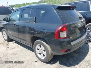 2014 Jeep Compass Sport with VIN 1C4NJCBA0ED511217, listed as a IAAI auction lot 42008976 with 210,780 mi miles. Bid and sale history available at carsss.com. Image 3.