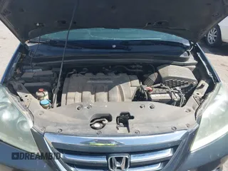 2005 Honda Odyssey TOURING with VIN 5FNRL38855B091754, listed as a IAAI auction lot 42131326 with 258,635 mi miles. Bid and sale history available at carsss.com. Image 10.
