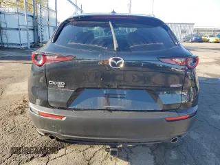 2020 Mazda CX-30 Premium z VIN 3MVDMBEM3LM126527, wystawiony jako Copart lot #53249135 z przebiegiem 42 320 mil mil oraz Szkoda całkowita • Salvage title. Historia ofert i sprzedaży dostępna na DreamBid. Obrazek 6.
