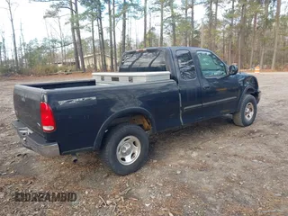2001 Ford F-150 XL z VIN 1FTRX18W81NA40901, wystawiony jako IAAI lot #41182038 z przebiegiem Nie podano mil oraz . Historia ofert i sprzedaży dostępna na DreamBid. Obrazek 4.