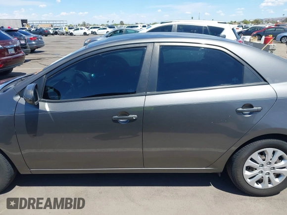 2013 Kia Forte EX with VIN KNAFU4A27D5724120, listed as a IAAI auction lot 42153084 with 154,860 mi miles. Bid and sale history available at carsss.com. Image 15.