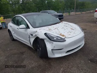 2023 Tesla Model 3 with VIN 5YJ3E1EA2PF626392, listed as a IAAI auction lot 42288413 with 25,605 mi miles and . Bid and sale history available at DreamBid. Image 1.