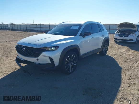 2024 Mazda CX-50 Premium z VIN 7MMVABDY0RN186511, wystawiony jako IAAI lot #41229255 z przebiegiem 21 842 mil mil oraz . Historia ofert i sprzedaży dostępna na DreamBid. Obrazek 17.