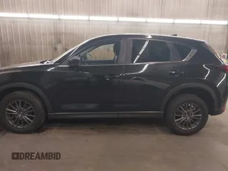 2020 Mazda CX-5 Touring with VIN JM3KFBCM9L1785125, listed as a IAAI auction lot 41983561 with 101,062 mi miles and . Bid and sale history available at carsss.com. Image 15.