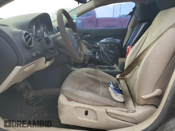 2005 Pontiac G6 GT with VIN 1G2ZH528254142595, listed as a Copart auction lot 47191785 with 228,493 mi miles and Salvage Title. Bid and sale history available at DreamBid. Image 7.