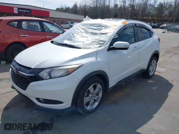 2016 Honda HR-V EX-L w/Navi with VIN 3CZRU6H75GM733050, listed as a IAAI auction lot 41832971 with 85,753 mi miles. Bid and sale history available at carsss.com. Image 2.