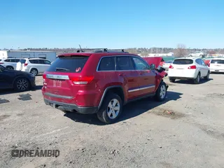 2012 Jeep Grand Cherokee Laredo with VIN 1C4RJFAG4CC297151, listed as a IAAI auction lot 41903618 with 222,357 mi miles. Bid and sale history available at carsss.com. Image 4.