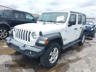2019 Jeep Wrangler Unlimited Sport S with VIN 1C4HJXDN3KW689739, listed as a IAAI auction lot 42358604 with 73,271 mi miles and . Bid and sale history available at DreamBid. Image 21.