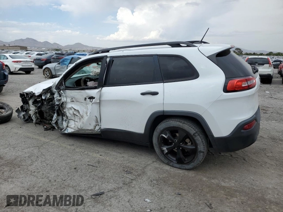 2017 Jeep Cherokee Altitude with VIN 1C4PJLAB2HW573567, listed as a Copart auction lot 59630205 with 105,975 mi miles and Salvage title. Bid and sale history available at DreamBid. Image 2.