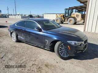 2015 BMW 4 Series 428i with VIN WBA3N3C56FK232040, listed as a Copart auction lot 49974885 with 48,450 mi miles and Salvage Title. Bid and sale history available at DreamBid. Image 4.
