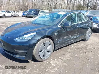 2020 Tesla Model 3 Long Range with VIN 5YJ3E1EB6LF600266, listed as a IAAI auction lot 41819374 with 28,406 mi miles. Bid and sale history available at carsss.com. Image 6.