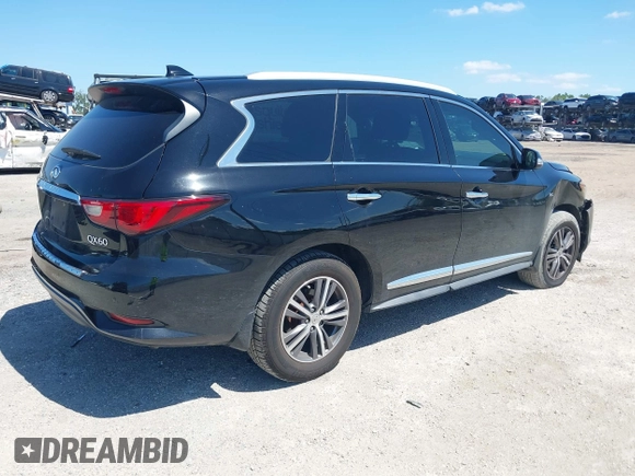 2017 Infiniti QX60 with VIN 5N1DL0MN3HC523856, listed as a IAAI auction lot 42036846 with 218,278 mi miles. Bid and sale history available at carsss.com. Image 4.