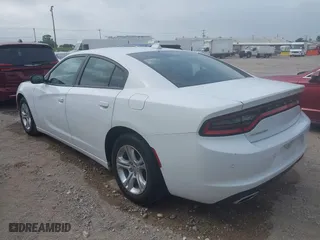 2023 Dodge Charger SXT with VIN 2C3CDXBG2PH530257, listed as a IAAI auction lot 42067908 with 56,294 mi miles. Bid and sale history available at carsss.com. Image 3.