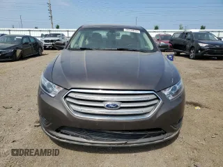 2015 Ford Taurus SEL with VIN 1FAHP2E82FG158662, listed as a Copart auction lot 58233875 with 159,174 mi miles and Salvage title. Bid and sale history available at DreamBid. Image 5.