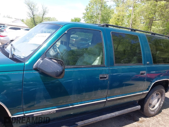 1997 GMC Suburban with VIN 3GKFK16R5VG508908, listed as a IAAI auction lot 42103068 with 264,446 mi miles and . Bid and sale history available at DreamBid. Image 15.