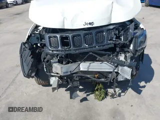 2021 Jeep Compass Latitude with VIN 3C4NJDBB7MT566237, listed as a IAAI auction lot 41747738 with 33,395 mi miles and . Bid and sale history available at DreamBid. Image 6.