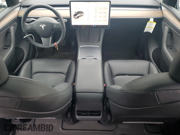 2023 Tesla Model Y Long Range with VIN 7SAYGDEE0PF746778, listed as a Copart auction lot 52704965 with 19,047 mi miles and Salvage Title. Bid and sale history available at DreamBid. Image 8.