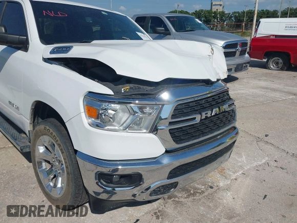 2022 Ram 1500 Big Horn z VIN 1C6RRFMG2NN430198, wystawiony jako IAAI lot #41944132 z przebiegiem 54 479 mil mil oraz . Historia ofert i sprzedaży dostępna na DreamBid. Obrazek 21.
