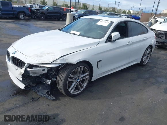 2019 BMW 4 Series 440i with VIN WBA4J5C52KBM65208, listed as a IAAI auction lot 41734154 with 52,477 mi miles and . Bid and sale history available at DreamBid. Image 18.