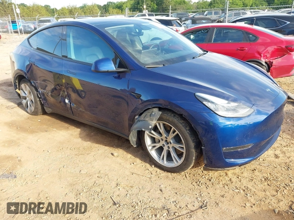 2022 Tesla Model Y Long Range z VIN 7SAYGDEE0NF429399, wystawiony jako IAAI lot #42333630 z przebiegiem 32 937 mil mil oraz . Historia ofert i sprzedaży dostępna na DreamBid. Obrazek 1.