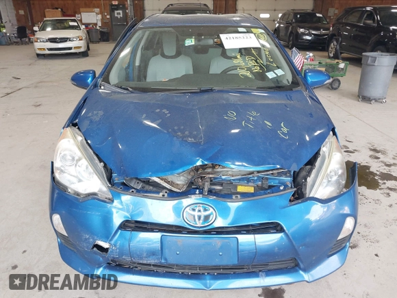 2012 Toyota Prius One with VIN JTDKDTB32C1023106, listed as a IAAI auction lot 42185223 with 210,691 mi miles. Bid and sale history available at carsss.com. Image 6.