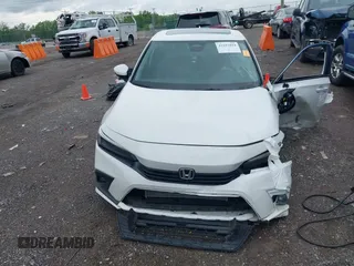 2024 Honda Civic Touring z VIN 2HGFE1F93RH341247, wystawiony jako IAAI lot #42102894 z przebiegiem Nie podano mil oraz . Historia ofert i sprzedaży dostępna na DreamBid. Obrazek 12.