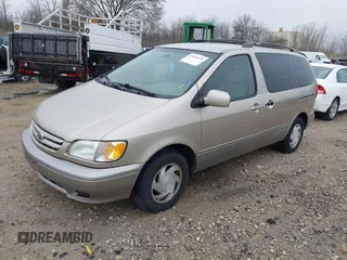 2003 Toyota Sienna LE with VIN 4T3ZF13C13U522248, listed as a IAAI auction lot 42070178 with 228,695 mi miles. Bid and sale history available at carsss.com. Image 2.