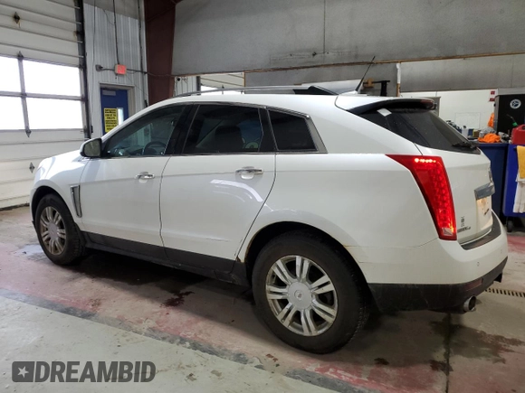2013 Cadillac SRX Performance Collection with VIN 3GYFNHE36DS520905, listed as a Copart auction lot 47961515 with 128,523 mi miles and Salvage Title. Bid and sale history available at carsss.com. Image 2.