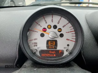 2014 MINI Countryman S with VIN WMWZC5C58EWP39797, listed as a Copart auction lot 62193515 with 84,989 mi miles and Salvage title. Bid and sale history available at DreamBid. Image 9.