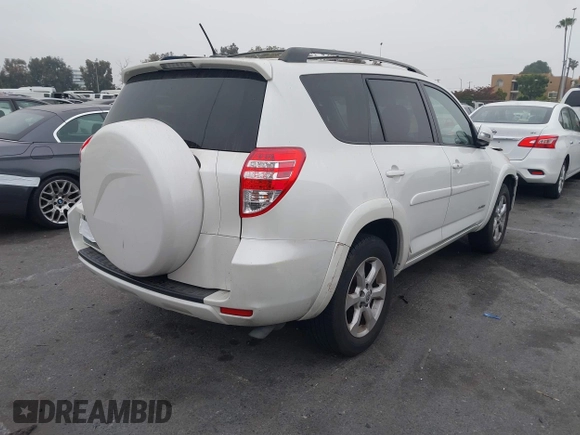2010 Toyota RAV4 Limited with VIN JTMYF4DV7A5031877, listed as a IAAI auction lot 42382323 with 205,957 mi miles and . Bid and sale history available at DreamBid. Image 4.