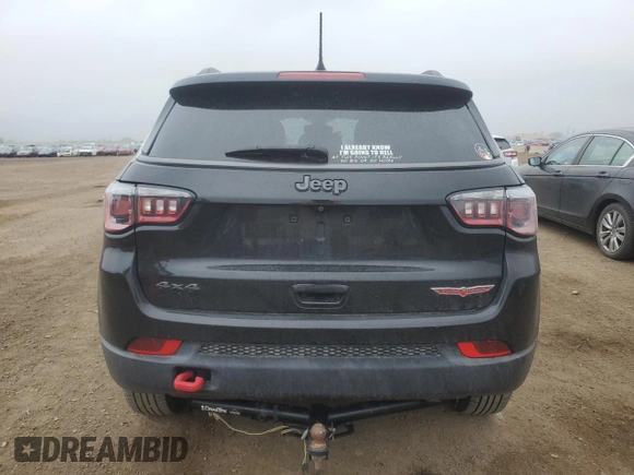 2018 Jeep Compass Trailhawk with VIN 3C4NJDDB6JT207289, listed as a Copart auction lot 56013675 with 83,385 mi miles and Salvage title. Bid and sale history available at DreamBid. Image 6.