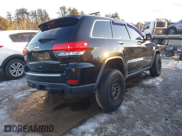 2014 Jeep Grand Cherokee Limited with VIN 1C4RJFBG5EC103342, listed as a IAAI auction lot 41195465 with 126,543 mi miles and . Bid and sale history available at DreamBid. Image 4.