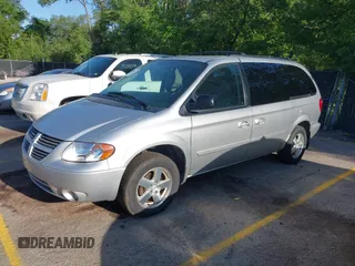 2005 Dodge Caravan SXT with VIN 2D4GP44LX5R540512, listed as a IAAI auction lot 42140912 with 259,855 mi miles and . Bid and sale history available at carsss.com. Image 2.