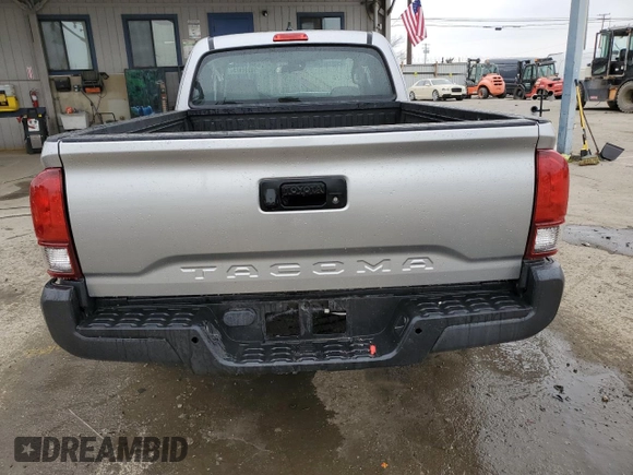 2018 Toyota Tacoma SR with VIN 5TFRX5GN1JX124112, listed as a Copart auction lot 50596975 with 57,587 mi miles and Salvage Title. Bid and sale history available at DreamBid. Image 6.