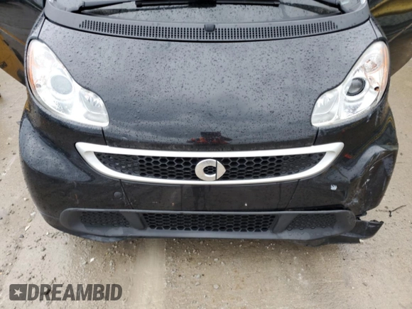2013 Smart fortwo Pure z VIN WMEEJ3BA0DK671030, wystawiony jako Copart lot #53307075 z przebiegiem 57 779 mil mil oraz Szkody całkowita. Historia ofert i sprzedaży dostępna na DreamBid. Obrazek 11.