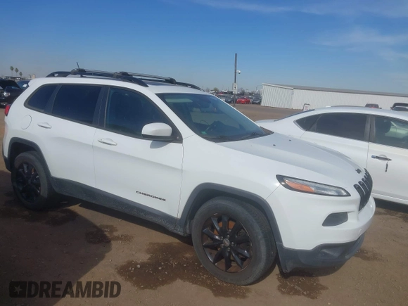 2014 Jeep Cherokee Latitude with VIN 1C4PJMCS7EW298115, listed as a IAAI auction lot 41605052 with 184,773 mi miles and . Bid and sale history available at DreamBid. Image 13.