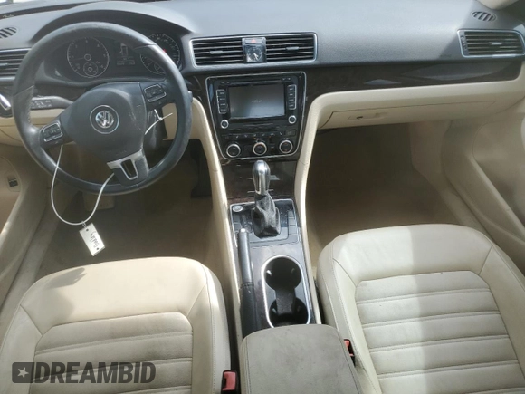 2014 Volkswagen Passat SEL Premium with VIN 1VWCN7A3XEC062797, listed as a Copart auction lot 60290515 with 83,279 mi miles and Salvage title. Bid and sale history available at DreamBid. Image 8.