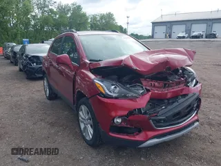 2020 Chevrolet Trax Premier with VIN 3GNCJRSB4LL237702, listed as a IAAI auction lot 42335138 with 61,041 mi miles and . Bid and sale history available at DreamBid. Image 1.