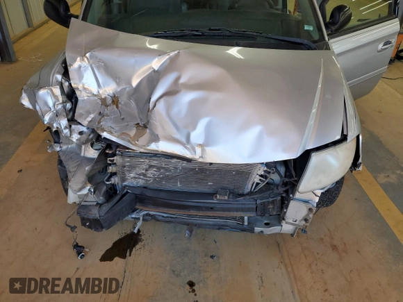 2005 Dodge Caravan SXT with VIN 2D4GP44L95R458500, listed as a Copart auction lot 53144985 with Not provided miles and Salvage title. Bid and sale history available at DreamBid. Image 14.