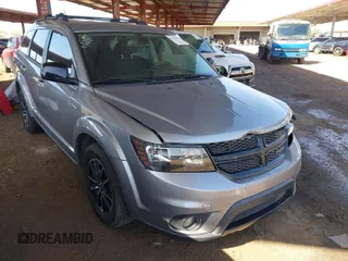 2018 Dodge Journey SXT with VIN 3C4PDCBG2JT528013, listed as a IAAI auction lot 41758790 with 69,101 mi miles. Bid and sale history available at carsss.com. Image 1.