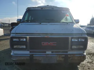 1995 GMC Vandura z VIN 1GDEG25K1SF505970, wystawiony jako Copart lot #87524905 z przebiegiem 130 163 mil mil oraz Tytuł czysty. Historia ofert i sprzedaży dostępna na DreamBid. Obrazek 5.