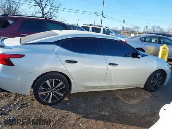 2018 Nissan Maxima SV with VIN 1N4AA6AP7JC372246, listed as a IAAI auction lot 41387139 with 104,686 mi miles and . Bid and sale history available at DreamBid. Image 13.