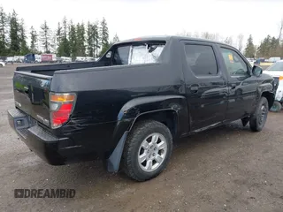2006 Honda Ridgeline RTL z VIN 2HJYK16596H530876, wystawiony jako IAAI lot #41906807 z przebiegiem Nie podano mil oraz . Historia ofert i sprzedaży dostępna na DreamBid. Obrazek 4.