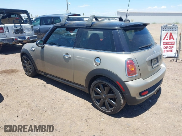 2010 MINI Hardtop S with VIN WMWMF7C50ATZ71187, listed as a IAAI auction lot 42440637 with 82,595 mi miles and . Bid and sale history available at DreamBid. Image 3.