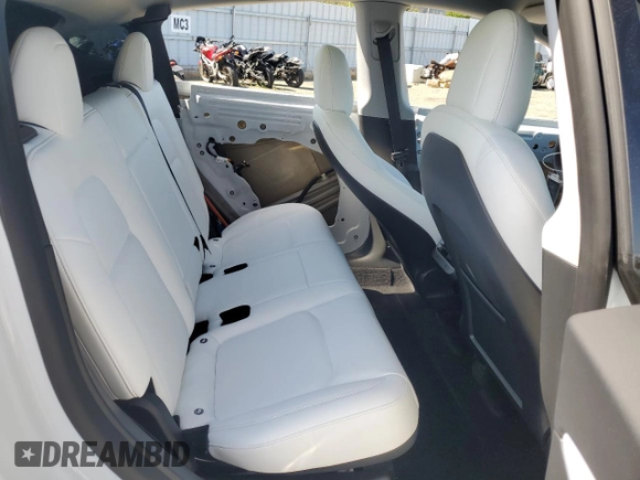 2021 Tesla Model Y Performance z VIN 5YJYGDEF2MF277467, wystawiony jako Copart lot #52410275 z przebiegiem 57 116 mil mil oraz Szkoda całkowita • Salvage title. Historia ofert i sprzedaży dostępna na DreamBid. Obrazek 12.