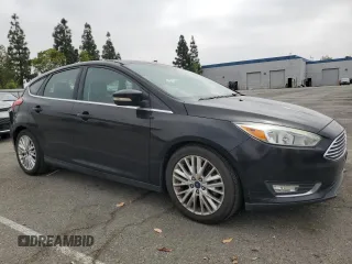 2015 Ford Focus Titanium z VIN 1FADP3N25FL324390, wystawiony jako Copart lot #59801805 z przebiegiem 97 615 mil mil oraz Szkoda całkowita • Salvage title. Historia ofert i sprzedaży dostępna na DreamBid. Obrazek 4.