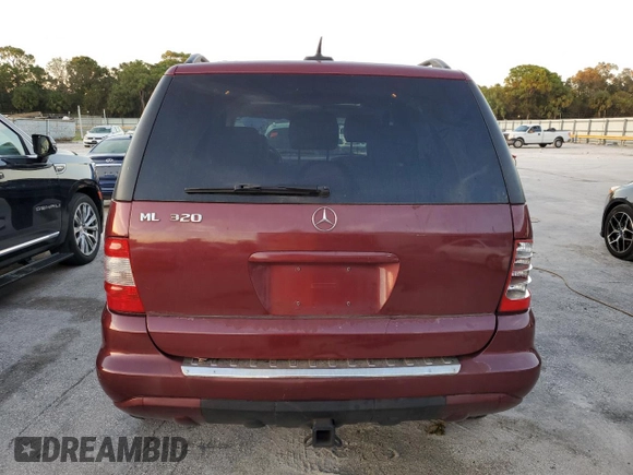 2002 Mercedes-Benz M-Class with VIN 4JGAB54E72A300774, listed as a Copart auction lot 75990134 with 312,541 mi miles and Salvage Title. Bid and sale history available at carsss.com. Image 6.
